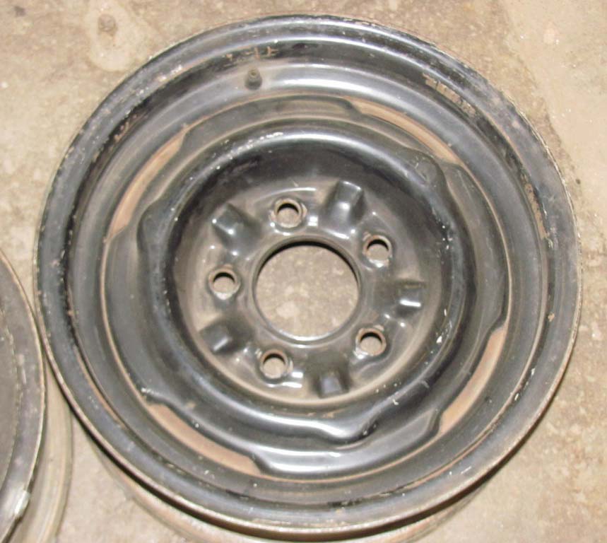 are bidding on a pair of 1963 Buicl, Olds or Pontiac 14X6 Steel Wheels